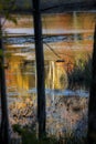 Abstract, colorful reflections on water of a bog in New Hampshire. Royalty Free Stock Photo