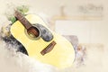 Abstract colorful shape on acoustic guitar in the foreground on watercolor painting background. Royalty Free Stock Photo