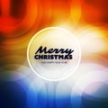 Merry Christmas - Modern Style Happy Holidays Greeting Card Design with Round Label, Sparkling Bright Blurred Background Royalty Free Stock Photo