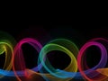 Abstract colorful neon light smoke waves on black background Royalty Free Stock Photo