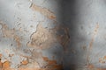 Abstract colorful texture background. Damaged, painted old wall with shadows in sunshine. Blue, orange and grey colour stone Royalty Free Stock Photo