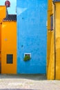 Abstract colorful walls and windows of the old houses. Copy space Royalty Free Stock Photo