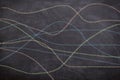 Abstract colorful wavy lines of crayons drawn by children on chalkboard, representing free hand drawing educational concept