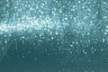 Sparkly glitter, blue background bokeh effect Royalty Free Stock Photo