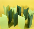 Abstract colour paper background. Green geometrical composition