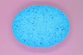 Abstract composition of blue sponge on pink background surface Royalty Free Stock Photo