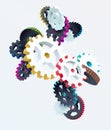 Abstract composition of colored gears on white background