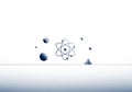To the design is an atom-like structure with orbiting elements, highlightin Royalty Free Stock Photo