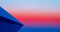 Abstract Geometric Composition with Blue Pyramid Shape Against a Gradient Sky Background image photo Royalty Free Stock Photo