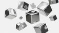 Abstract composition of floating polished chrome cubes in various sizes with sharp edges and reflective surfaces on a Royalty Free Stock Photo