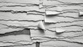 Abstract composition of layered torn paper with rough textured edges and shadows Royalty Free Stock Photo
