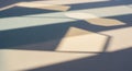 Abstract composition showing geometric shadows on a textured surface. The Royalty Free Stock Photo