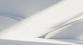 Abstract composition with smooth, flowing white surfaces casting soft shadows. The curved lines Royalty Free Stock Photo