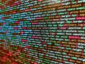 Abstract computer script source code. Programmer working in a software develop company office. Background of software developer Royalty Free Stock Photo