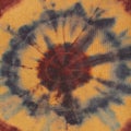 Abstract concentric circles on brown silk batik