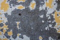 Abstract concrete and paint background with the yellow paint flacking Royalty Free Stock Photo