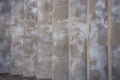 Abstract concrete wall with vertical columns as background. Cement wall with concrete pillars.