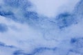Abstract contemporary fresh  background on a textural surface in blue tones. Unique background. Blue sky and clouds Royalty Free Stock Photo