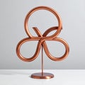 Abstract Copper Knot Sculpture on Display Royalty Free Stock Photo