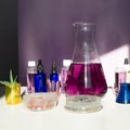 Abstract cosmetic or chemical laboratory. Laboratory equipment, flasks, test tubes, petri dishes. Creative concept with hard Royalty Free Stock Photo