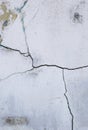 Abstract crack texture on old white paint cement wall, vertical style Royalty Free Stock Photo