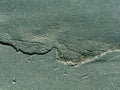 Abstract cracked asphalt texture. Royalty Free Stock Photo