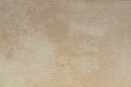 Abstract cream brown artificial leather texture, background. Royalty Free Stock Photo