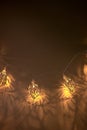 Abstract creative golden christmas garland light on light background. template. Concept idea design Royalty Free Stock Photo