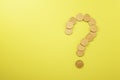 Abstract creative golden coin question mark on yellow backdrop with mock up place. Money, uncertainty and crisis concept. 3D