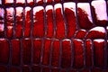 Abstract crocodile skin texture in red color, as wallpaper