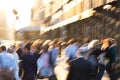 Abstract crowd of blurred people walking down street in New York City