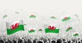 Abstract crowd with flag of Wales. Peoples protest, revolution, strike and demonstration with flag of Wales