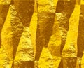 Abstract crumpled gold pattern of folded brushed foil Royalty Free Stock Photo