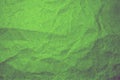 Abstract crumpled green paper background
