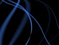 Abstract curved neon lines on a dark background