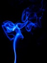 Abstract colored smoke isolated in black background Royalty Free Stock Photo