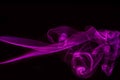 Abstract colored smoke isolated in black background Royalty Free Stock Photo