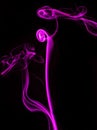 Abstract colored smoke isolated in black background Royalty Free Stock Photo