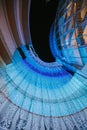 Abstract Curving Blue and Orange Light Trails Under a Modern Highway Overpass at Night Royalty Free Stock Photo
