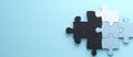 Abstract 3D Puzzle Pieces in Black, White, and Blue Interlocking on a Serene Light Blue Background, Symbolizing Unity and Royalty Free Stock Photo