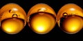 Abstract 3D rendering of amber spheres with bubbles floating in a dark void