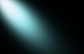 Abstract dark background with soft blue light gradient shining down from top left corner creating a calming atmosphere with subtle Royalty Free Stock Photo