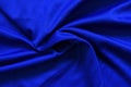 Abstract dark blue crumpled fabric texture background - Smooth elegant blue silk , satin luxury cloth wave Royalty Free Stock Photo