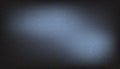 Abstract dark blue vignette background with subtle grainy texture and soft spotlight effect Royalty Free Stock Photo