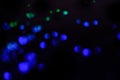 Abstract dark christmas background with blue lights. Bokeh, blur Royalty Free Stock Photo