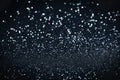Abstract dark Christmas glowing background with shiny defocused lights, bokeh Royalty Free Stock Photo