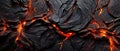 Abstract dark cracked surface with glowing, red lava flowing between the cracks on dark ominous background. Royalty Free Stock Photo