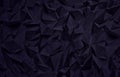 Abstract dark geometric design with sharp angular shapes, deep shadows, and textured facets. The dark purple tones create a modern