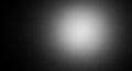 Abstract Dark Gray Background With A Soft White Circular Light Glow In The Center Creating A Subtle Spotlight Effect Royalty Free Stock Photo