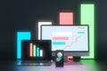 Abstract dark neon designer desktop with glowing laptop computer monitors, smartphone screen and business charts, graphs and Royalty Free Stock Photo